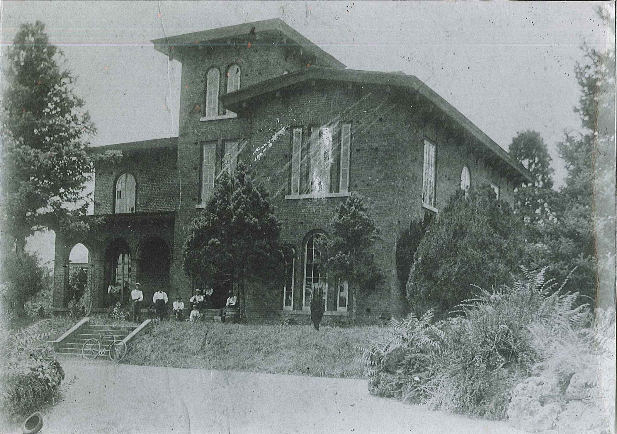 a black and white photo of a house
