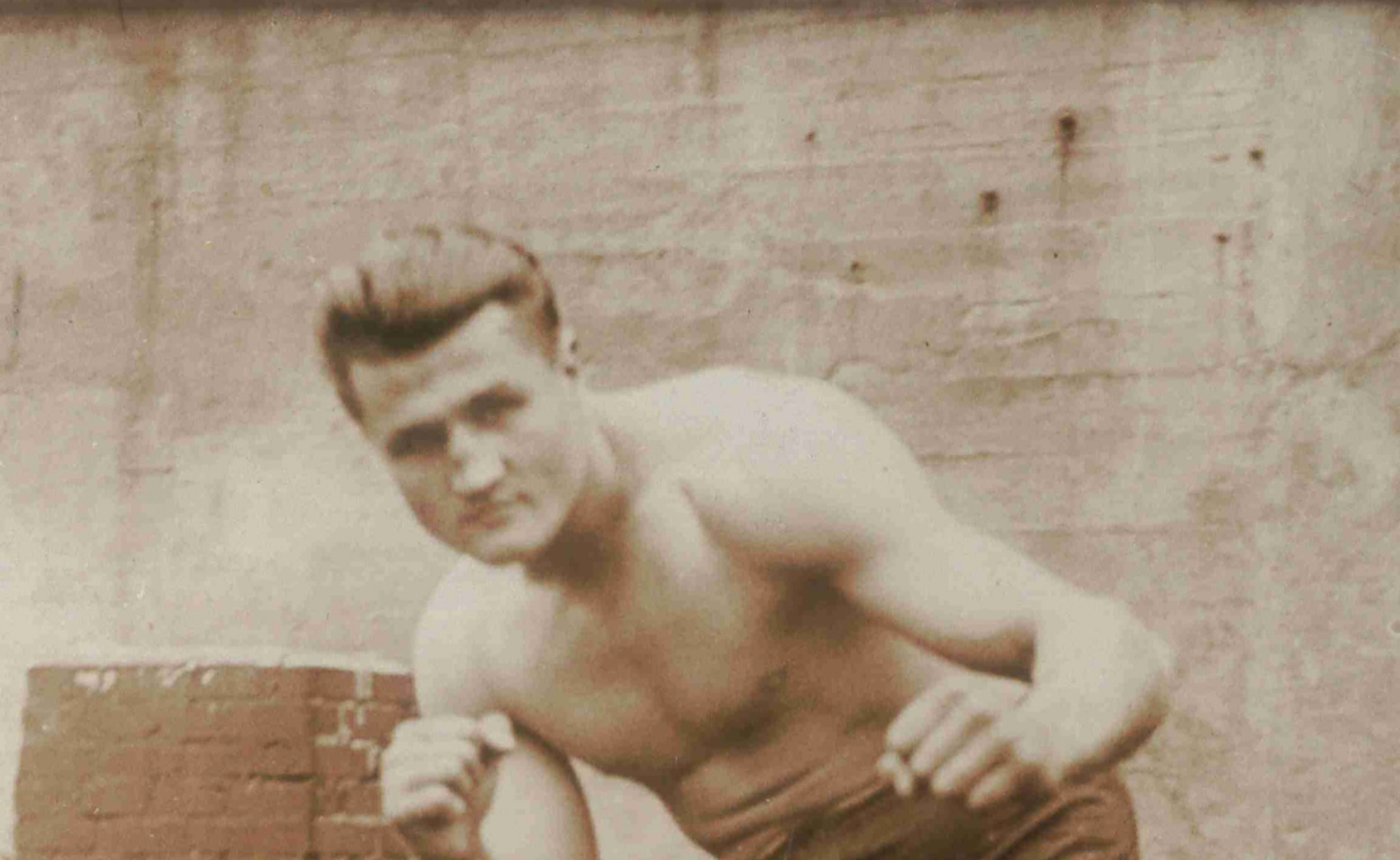 a man with no shirt