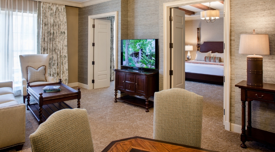 a room with a television and a bed