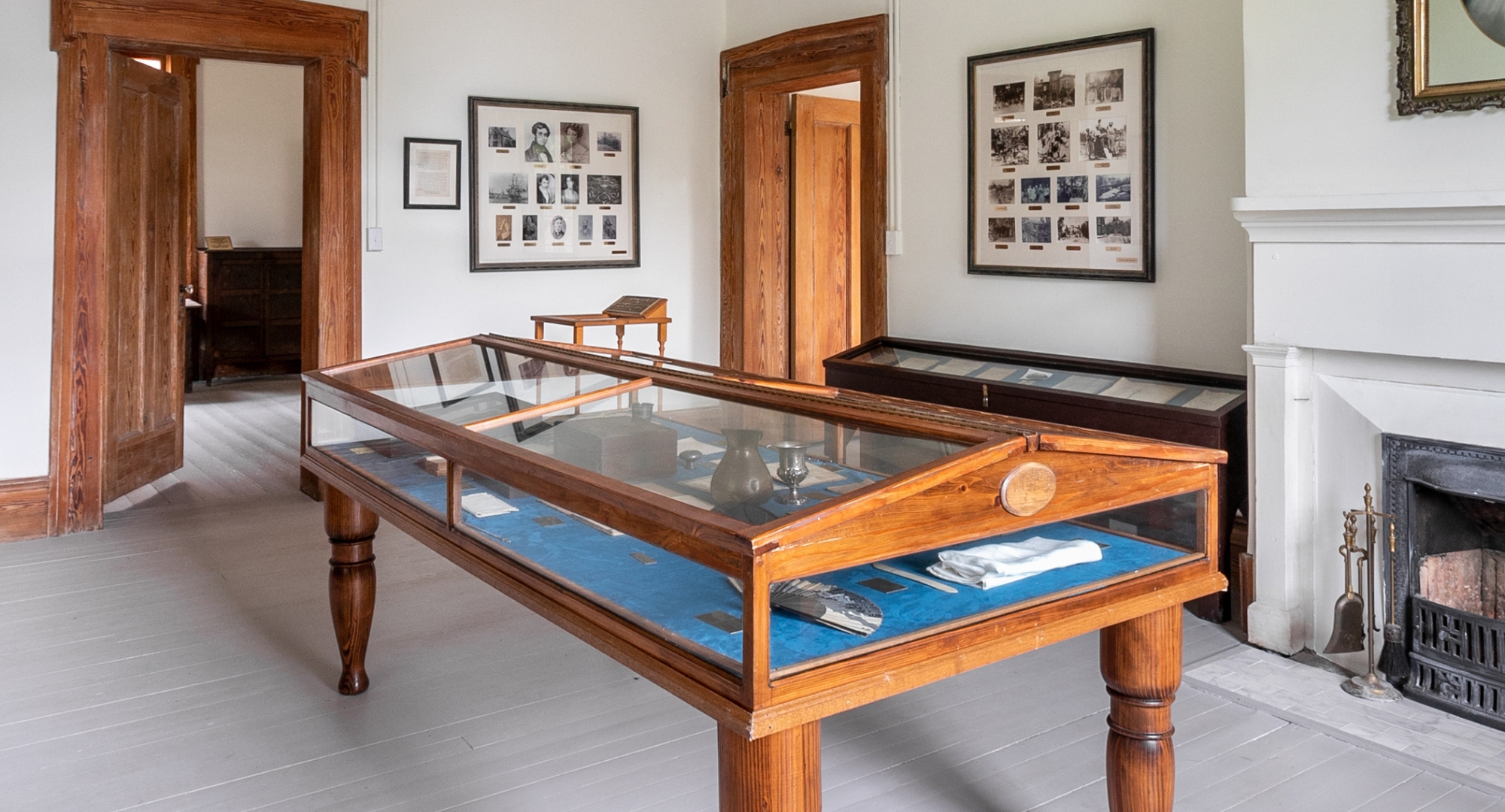 a glass display case in a room