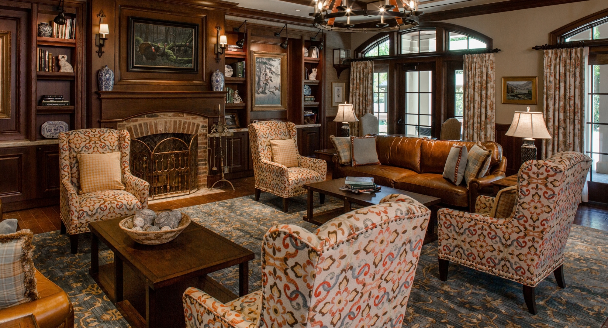 a living room with a fireplace and couches