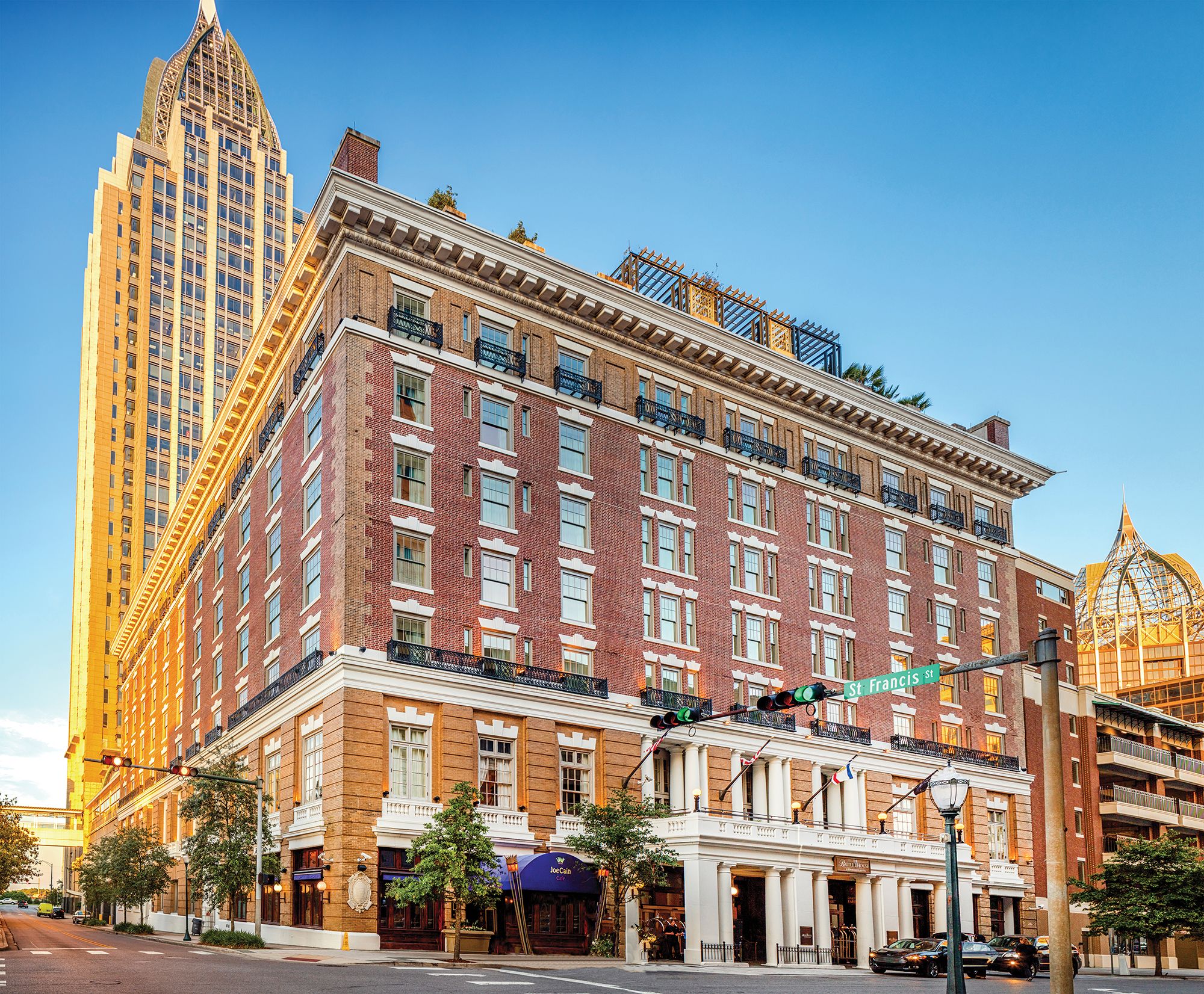 a building with a tall building in the background