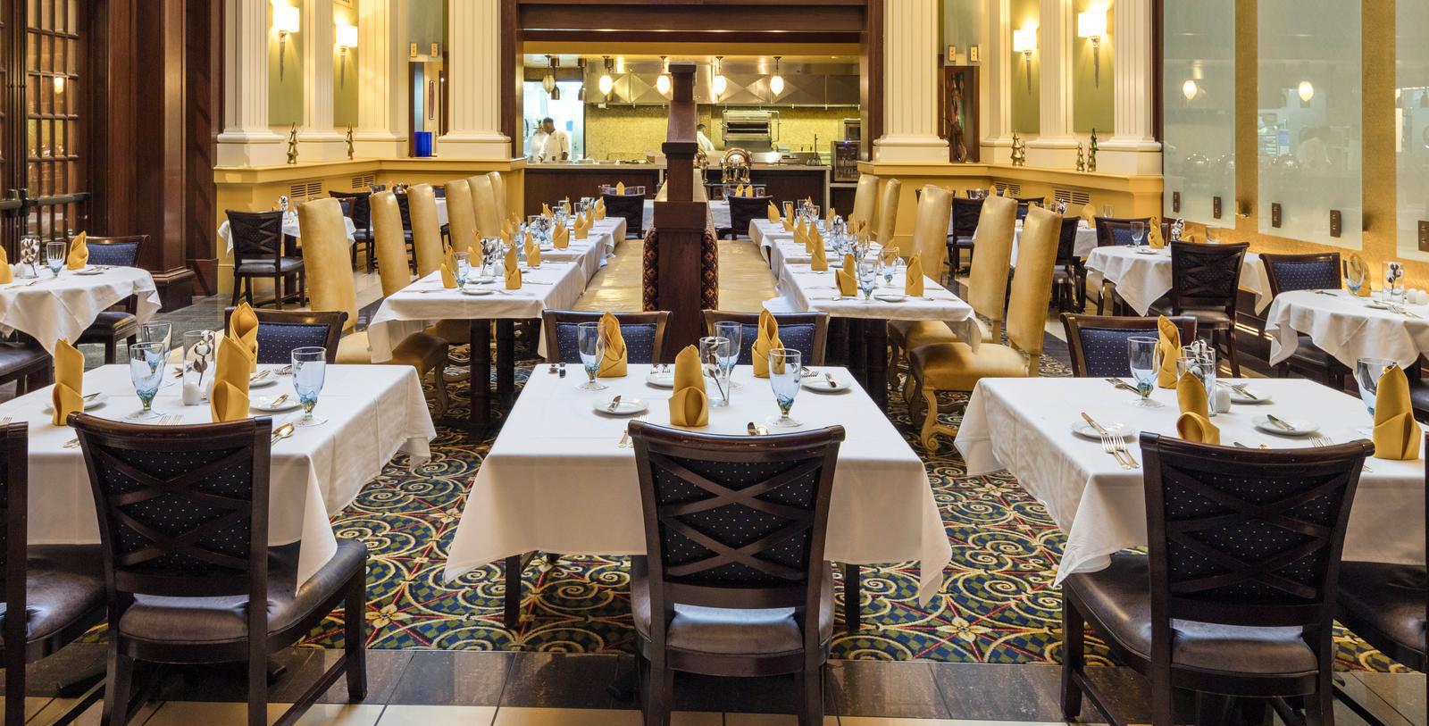 a restaurant with tables and chairs