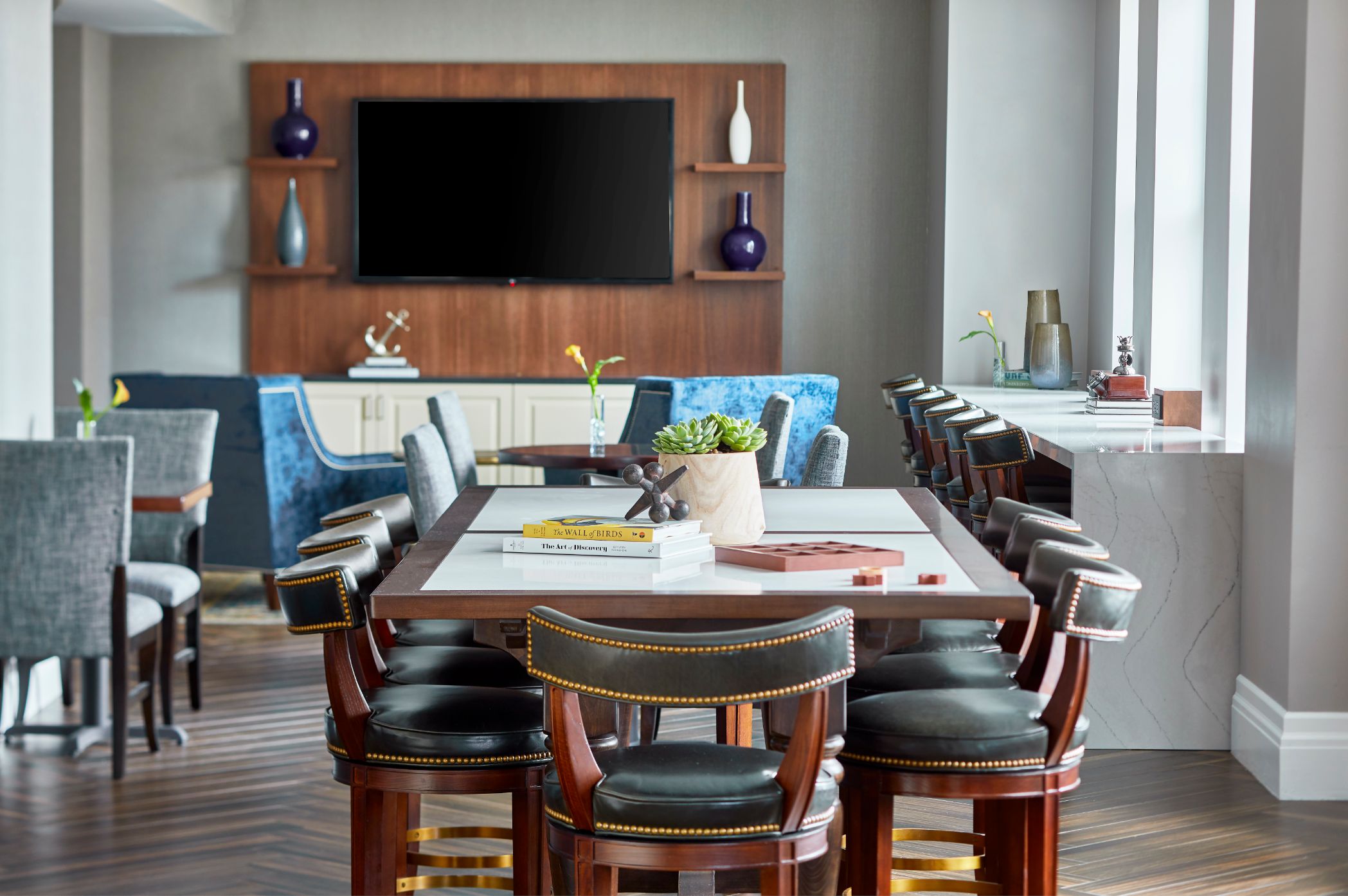 a room with a table and chairs