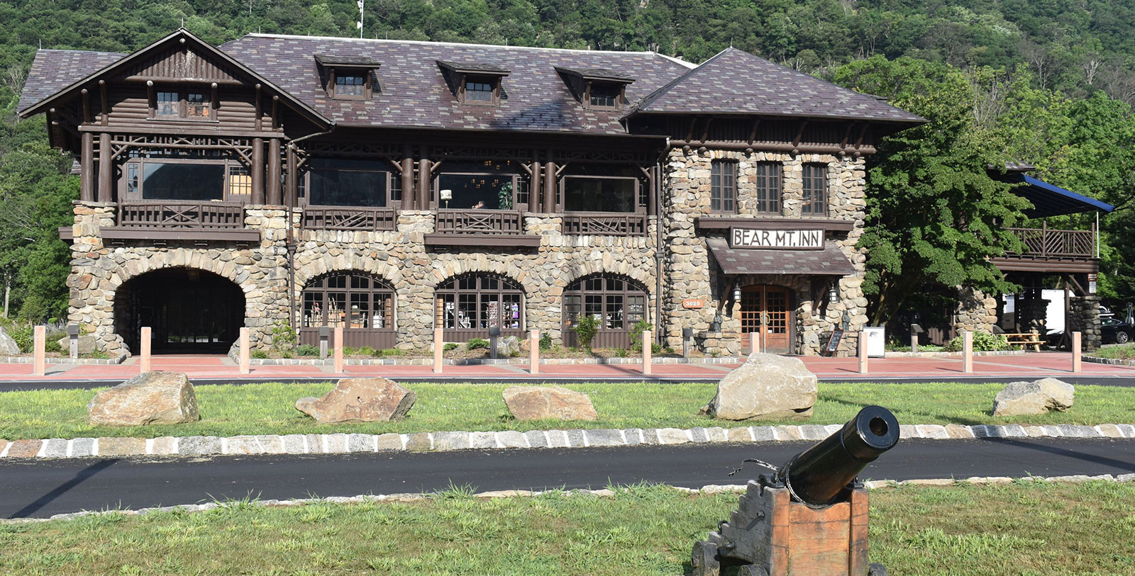 a building with a gun in the background