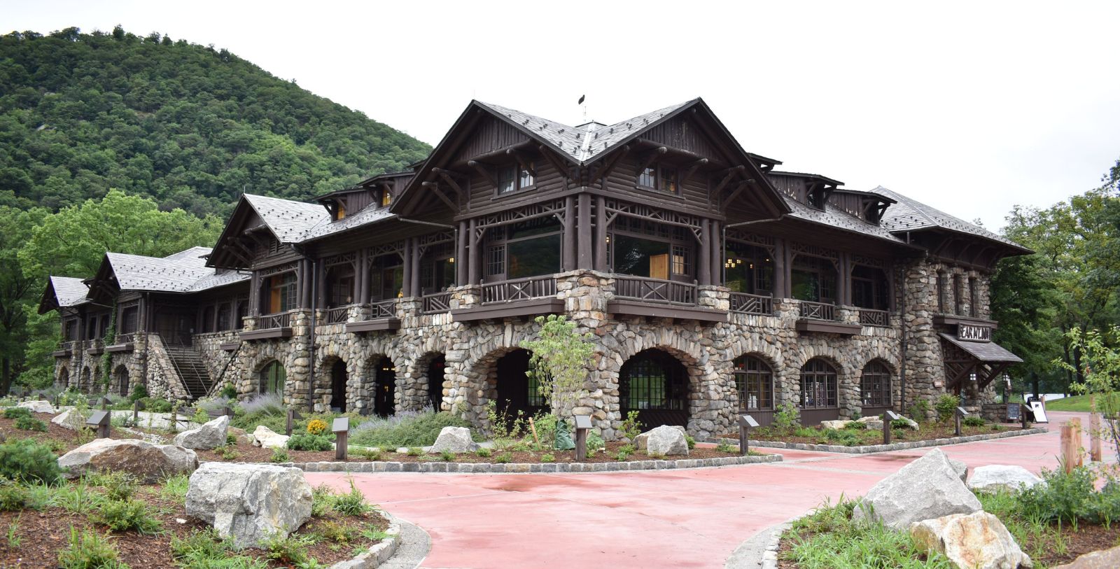 a large building with a stone driveway