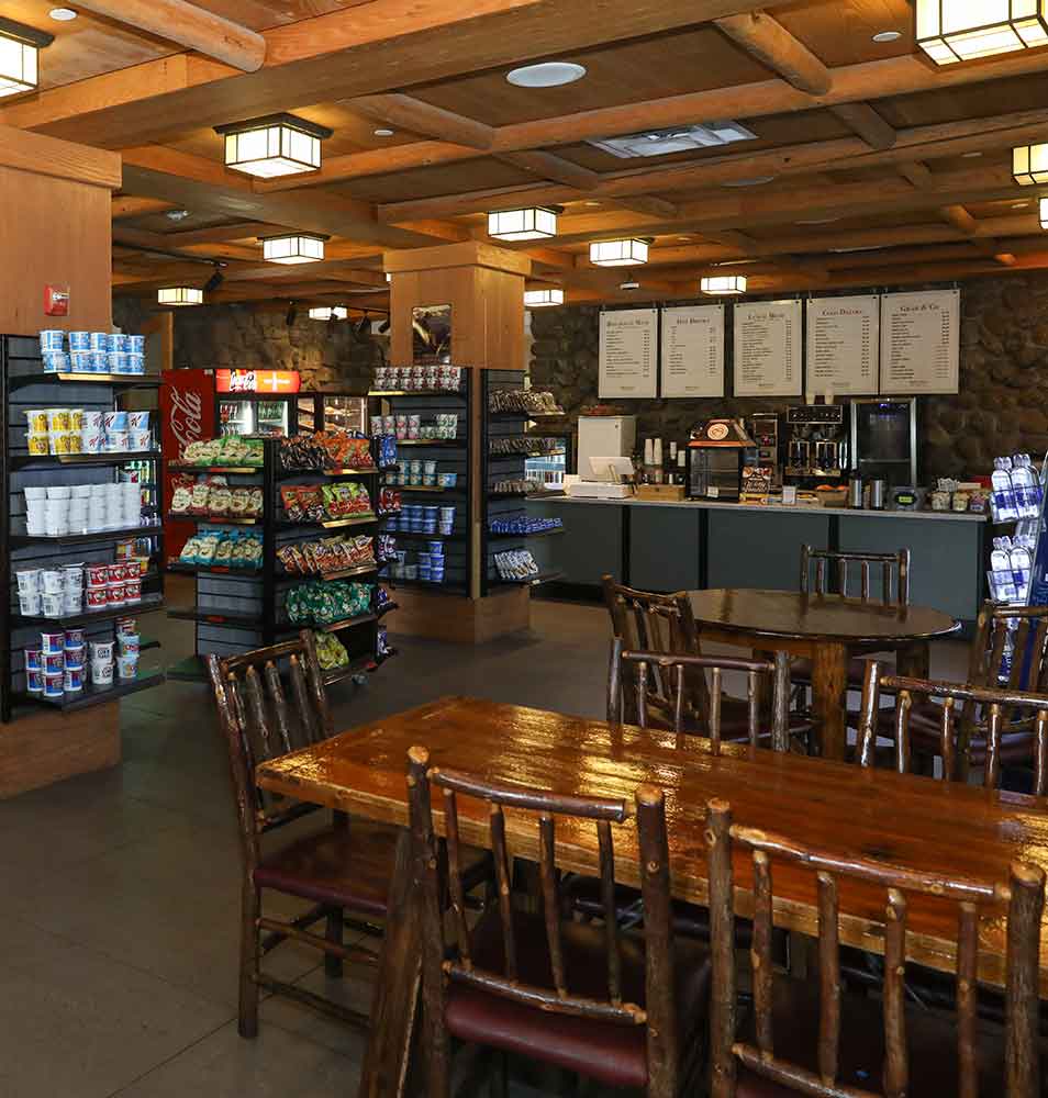 a coffee shop with tables and chairs