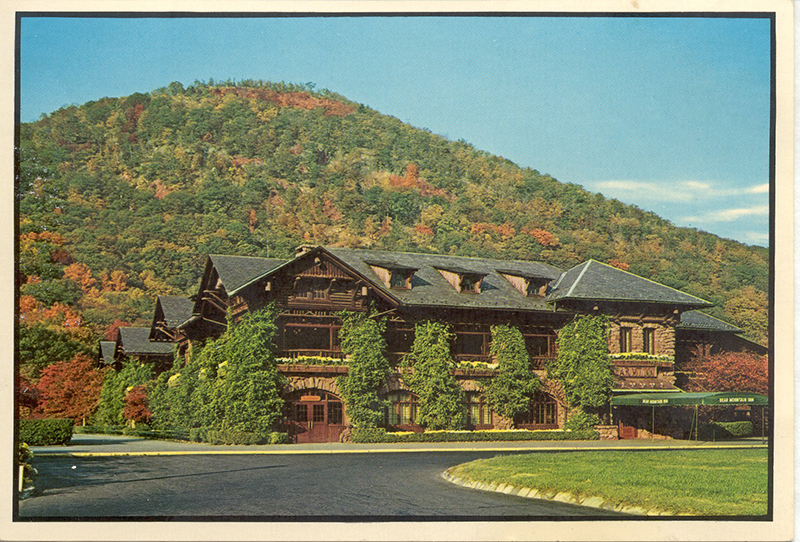 a large building with trees on the side of it