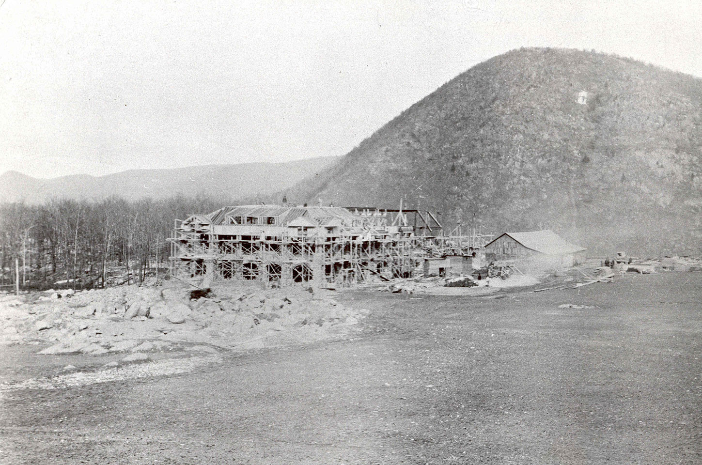 a building under construction in the mountains