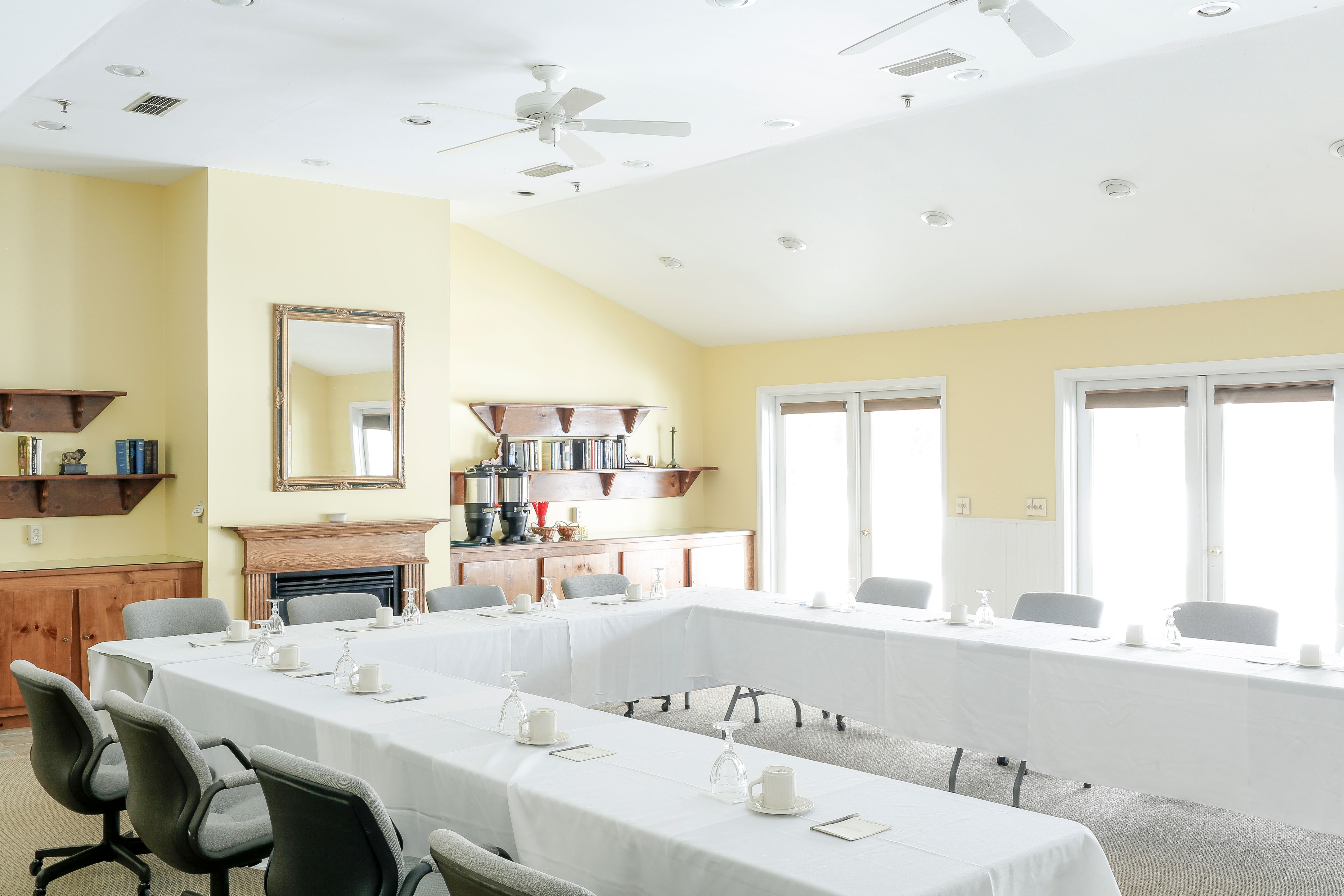 a room with tables and chairs