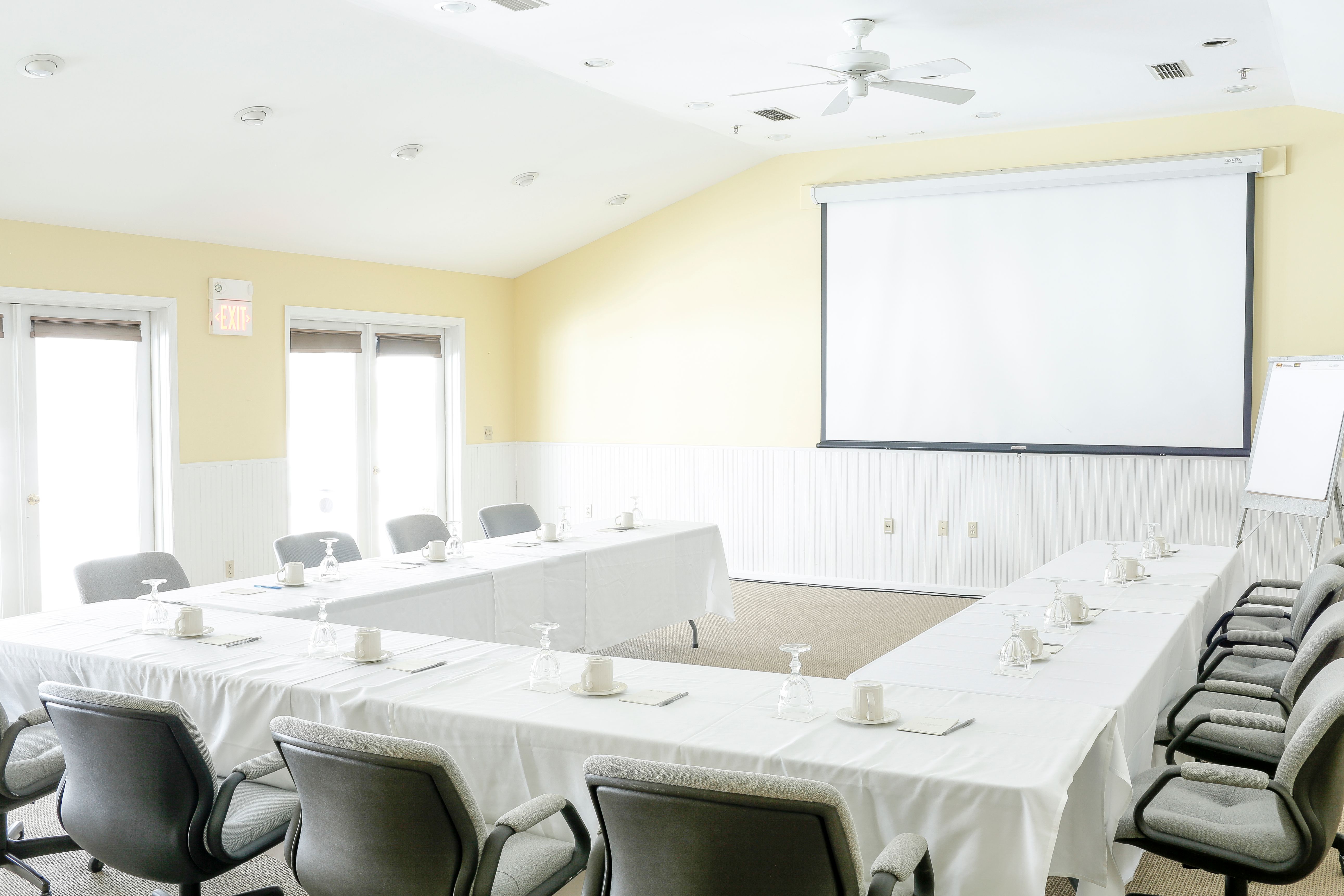 a room with tables and chairs