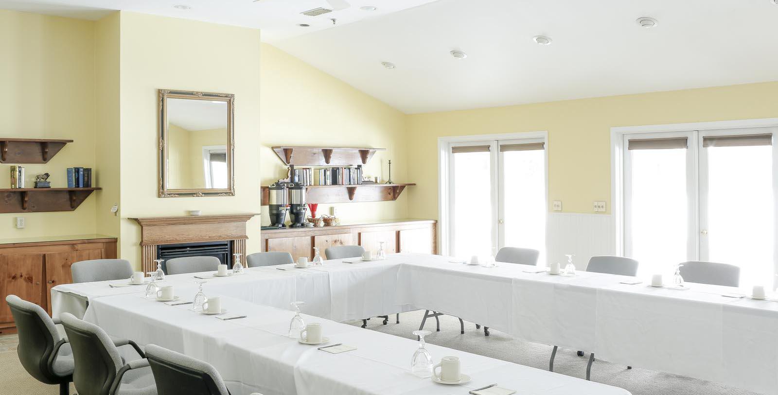 a room with tables and chairs