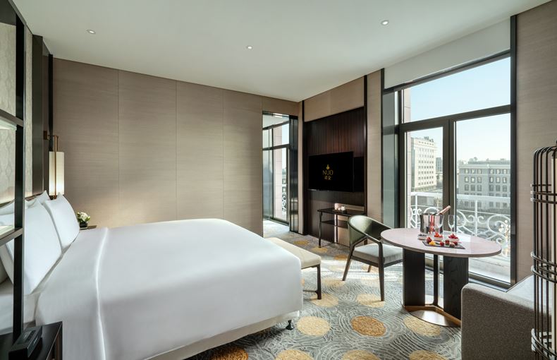 a room with a bed and a table