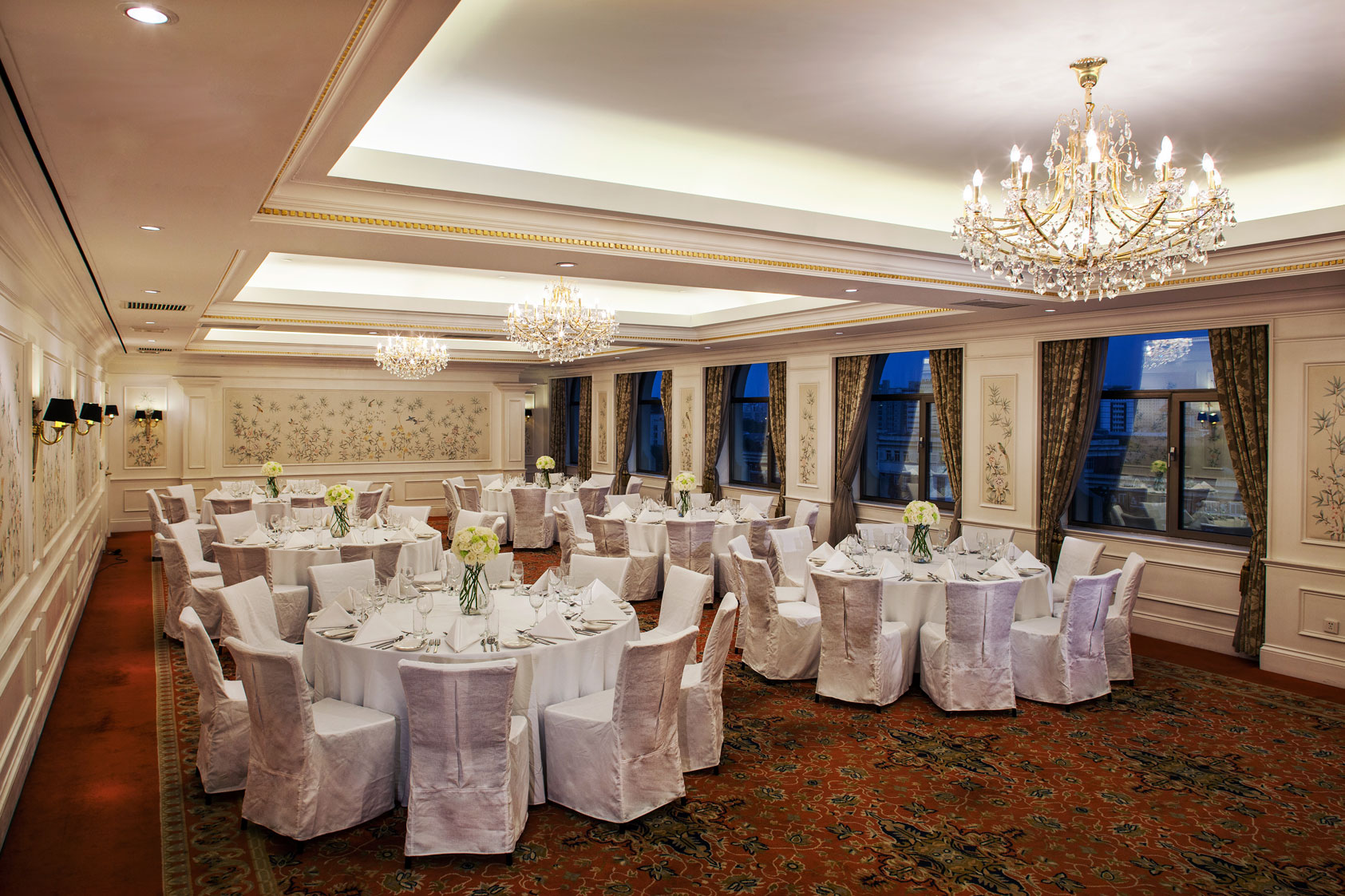 a room with tables and chairs