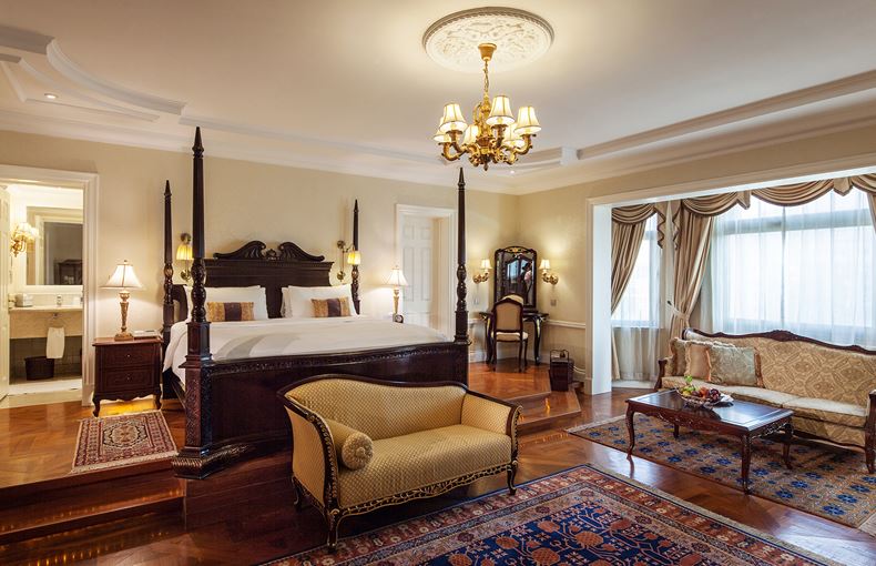 a room with a bed and a couch