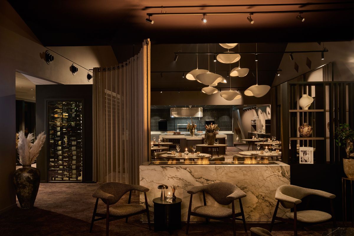a room with a bar and wine rack