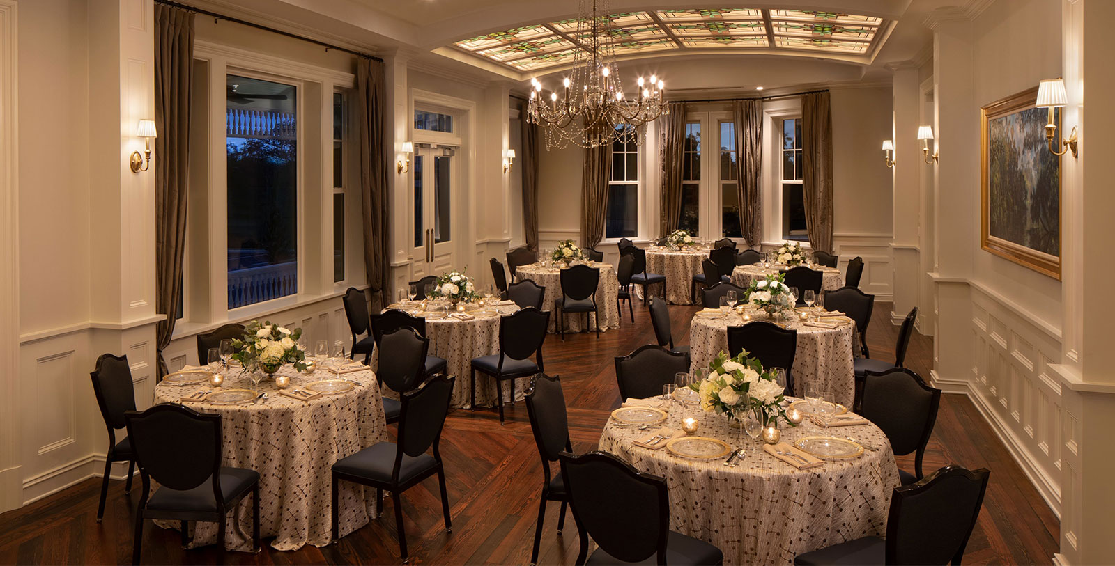 a room with tables and chairs