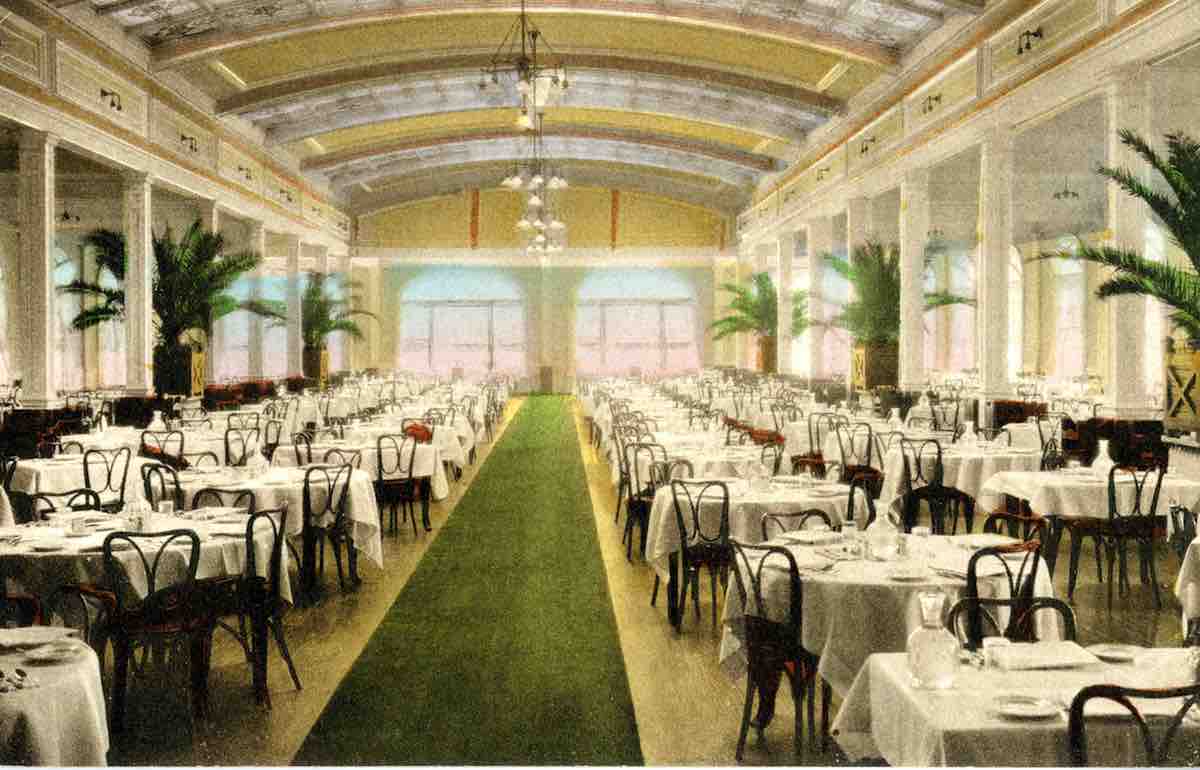 a room with tables and chairs