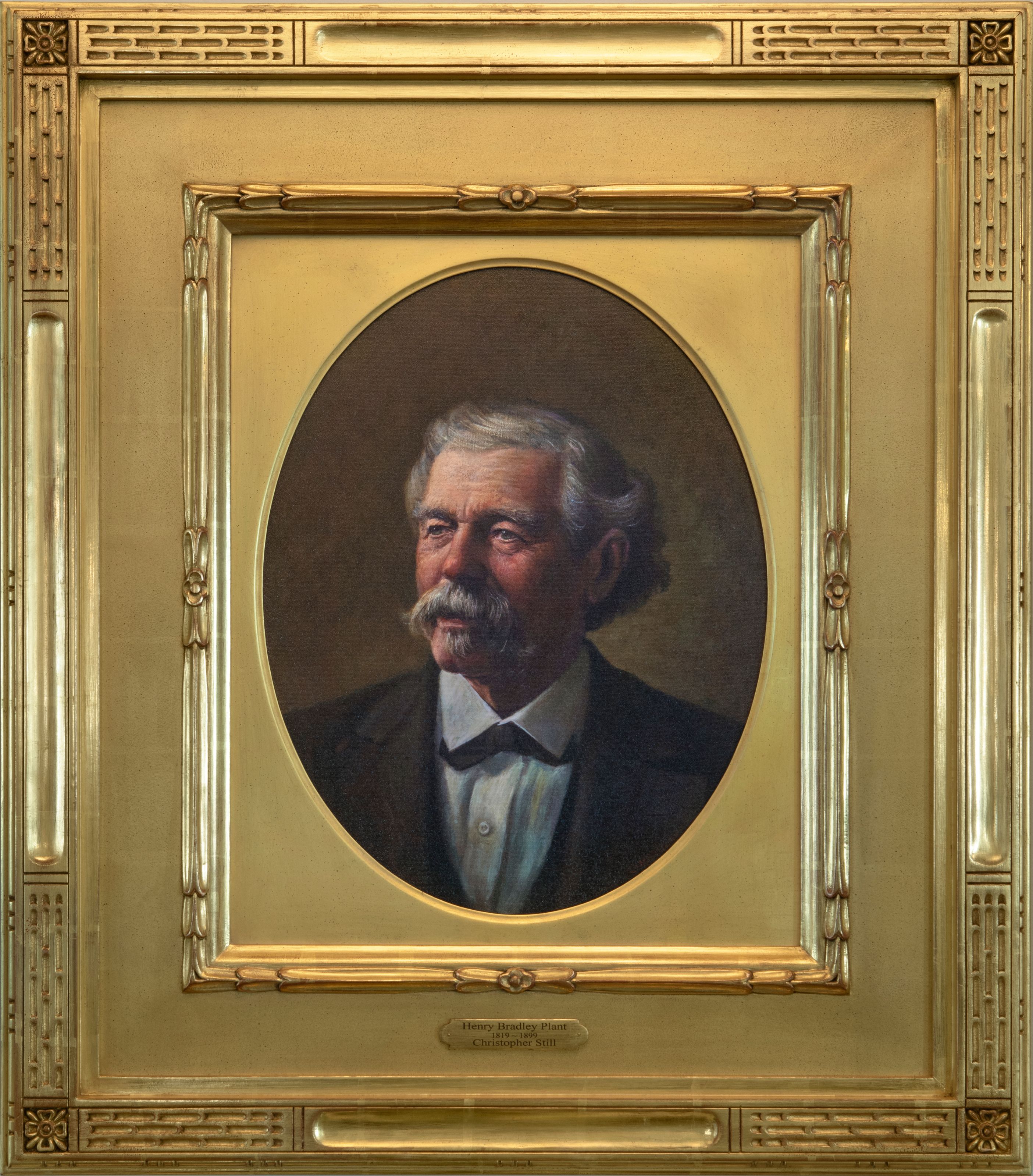 a painting of a man in a gold frame