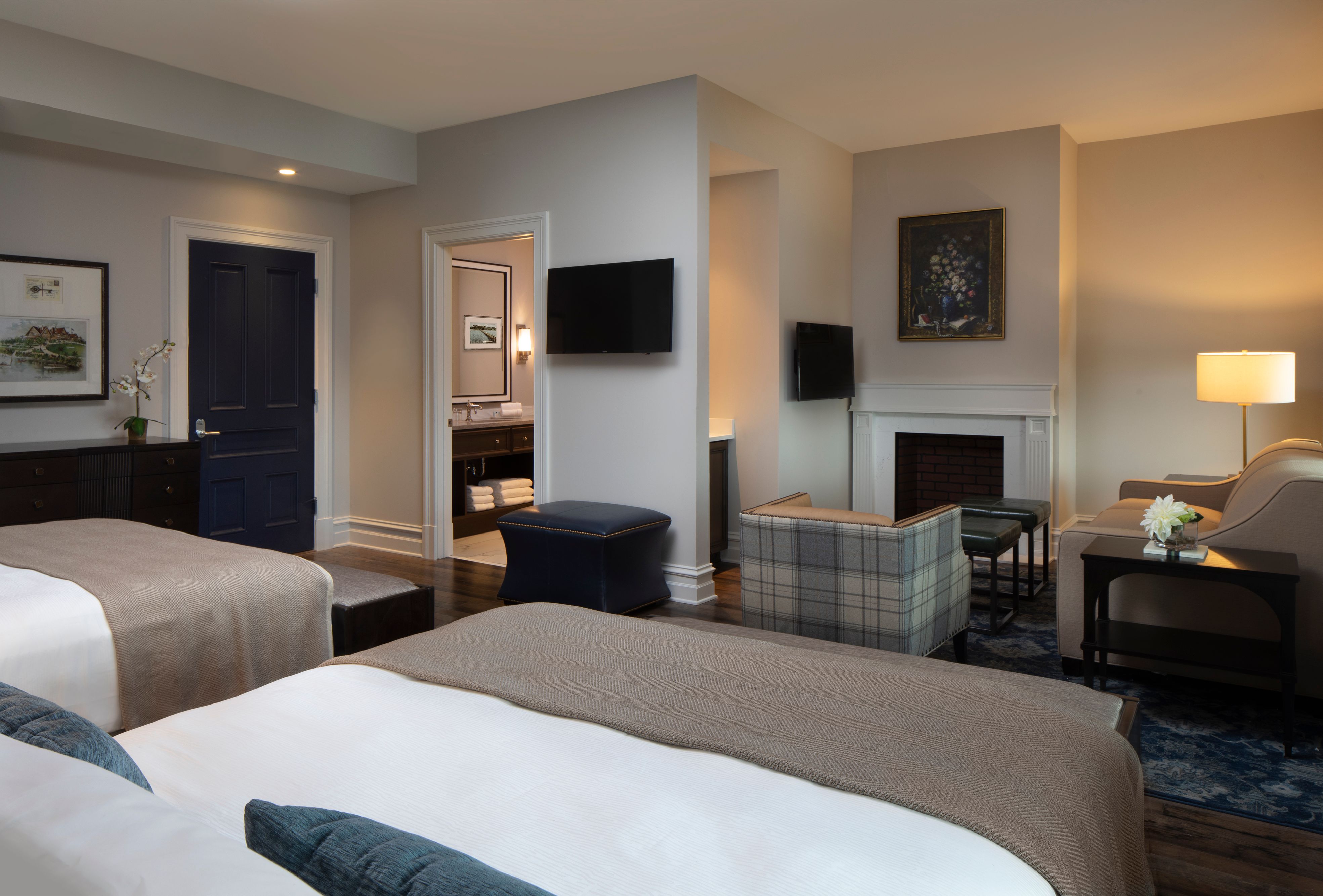 a room with a bed and a fireplace