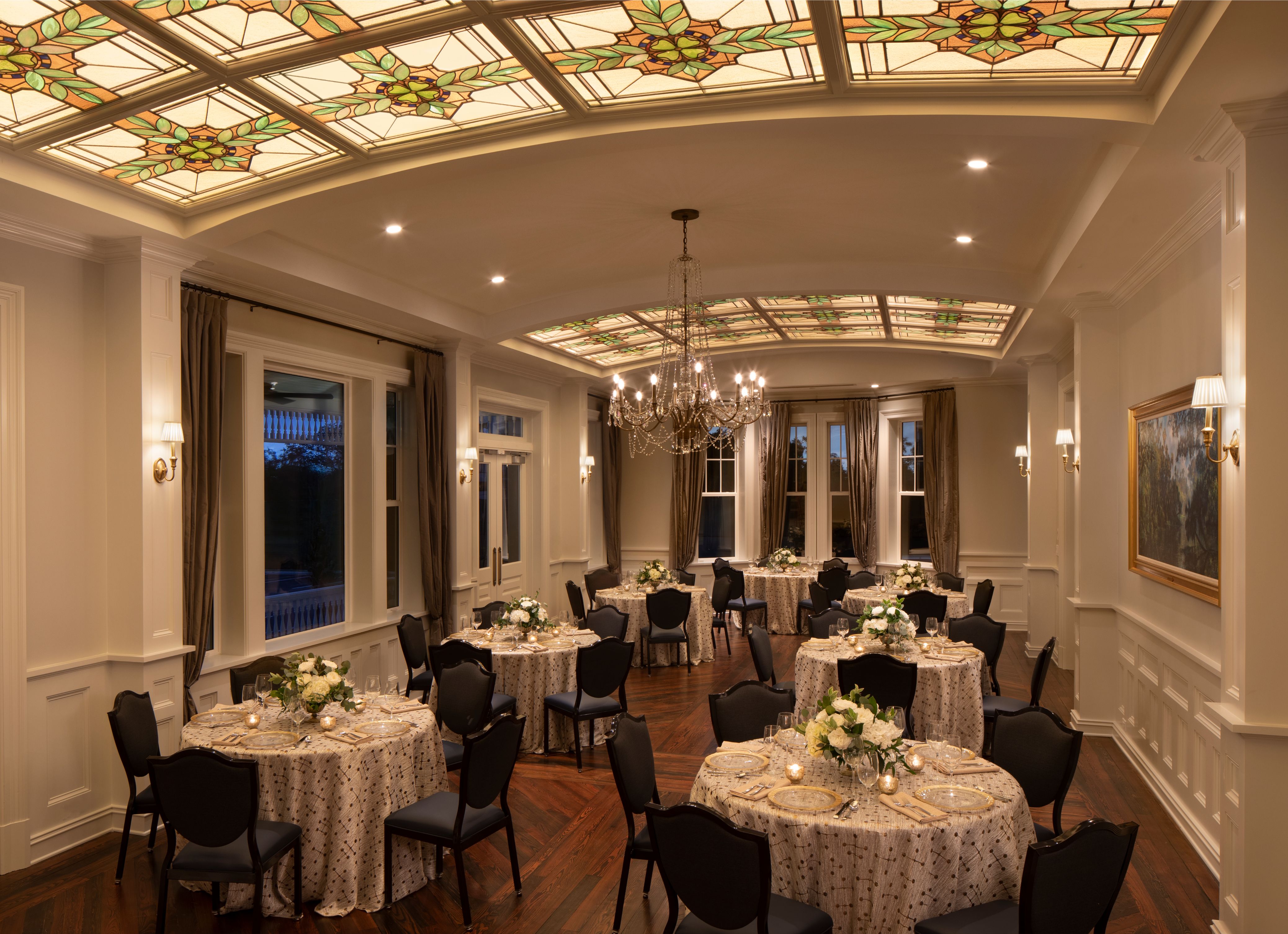a room with tables and chairs