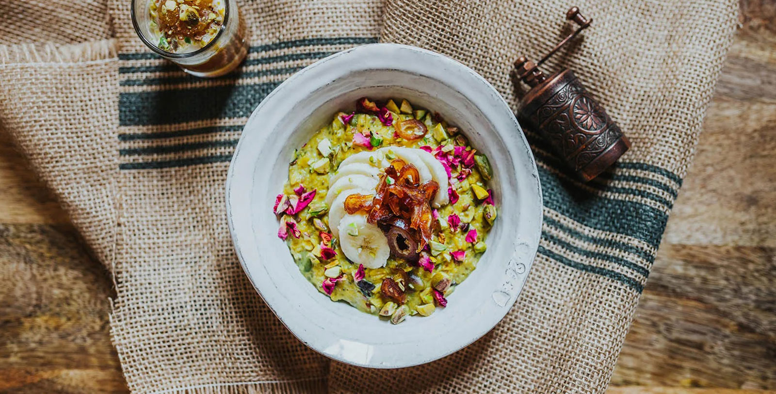 a bowl of food with fruit and nuts