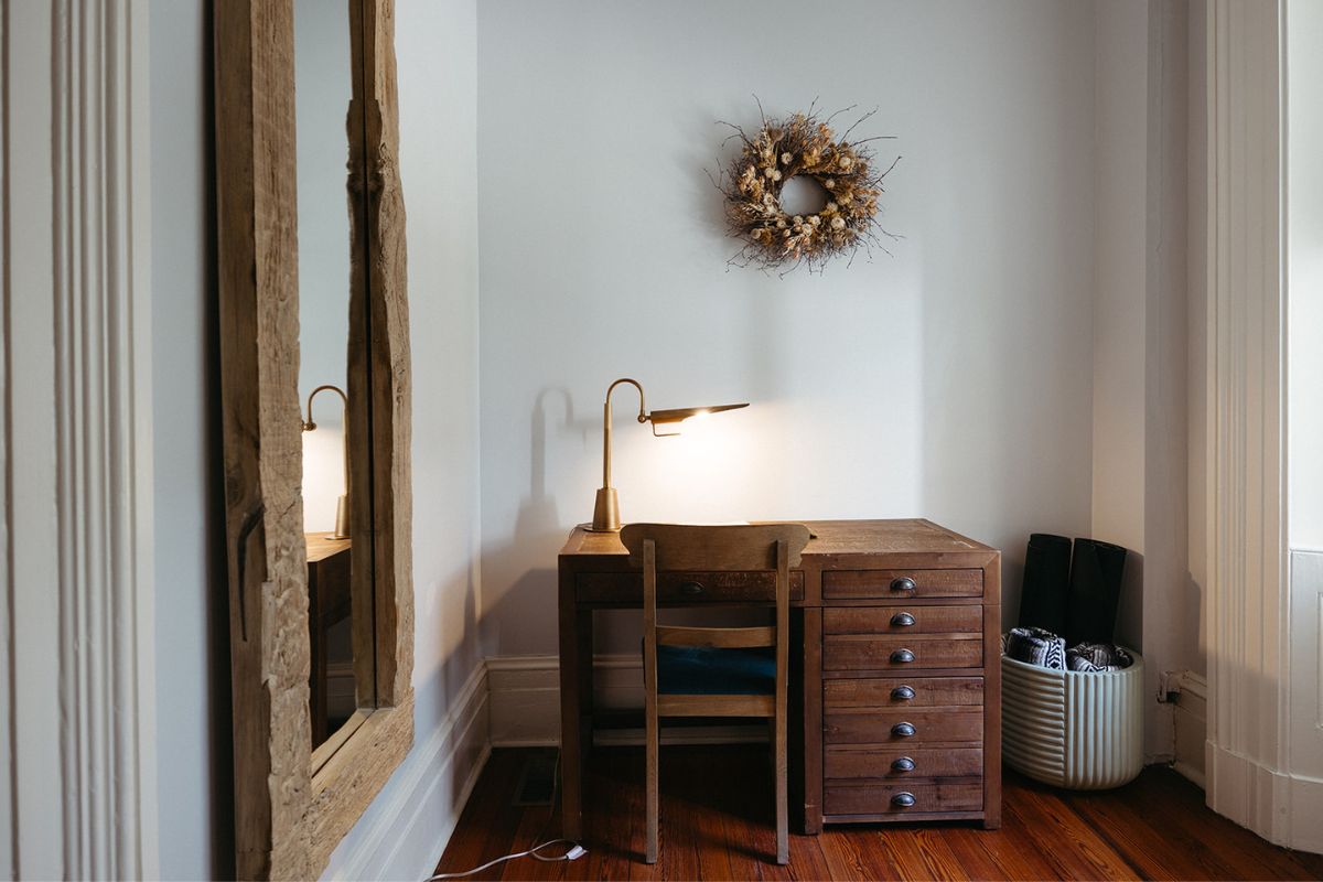 a desk and chair in a room