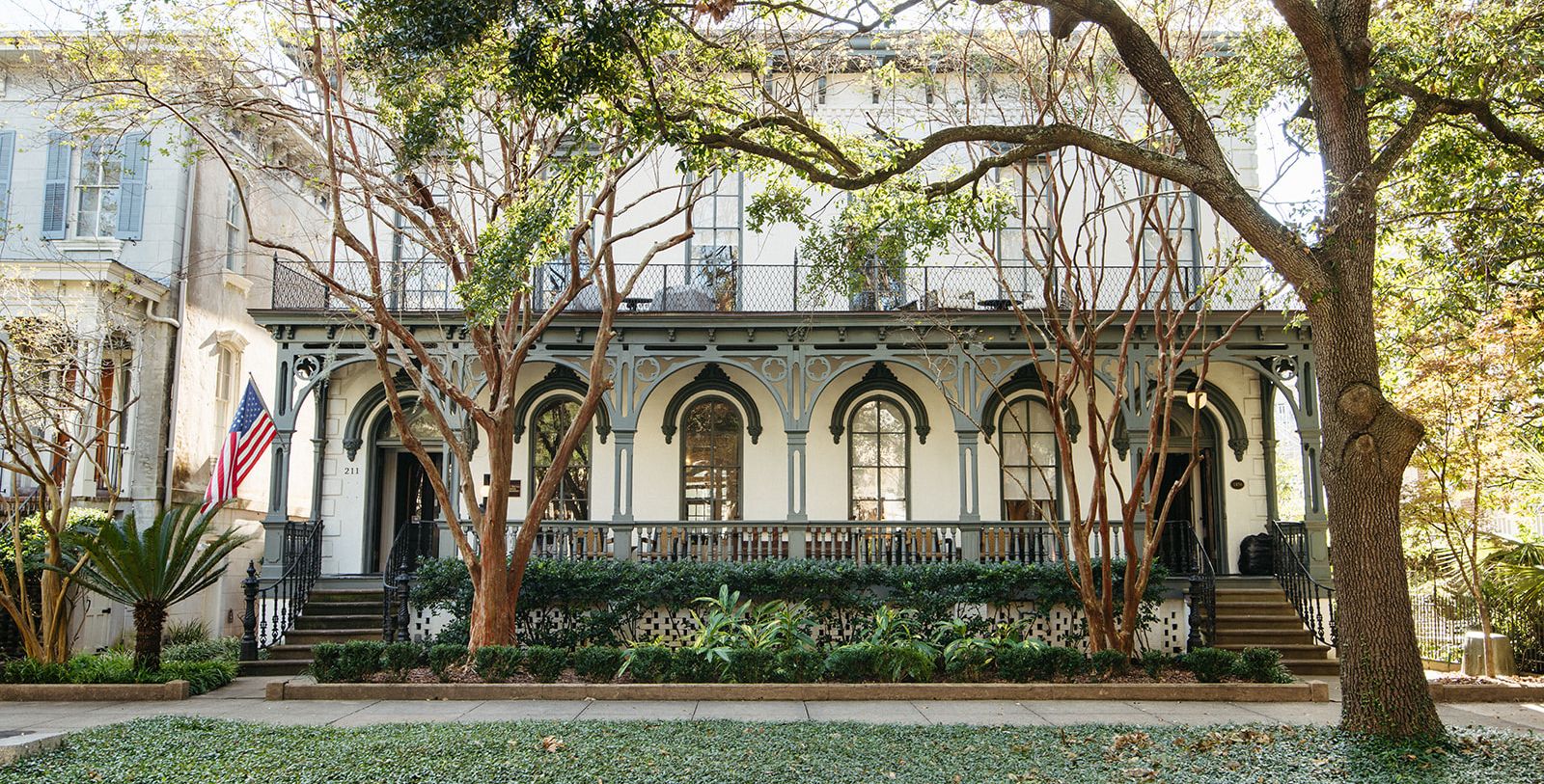 a building with trees and bushes