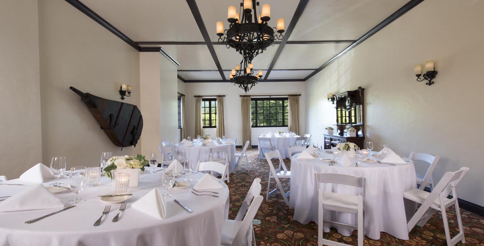 a room with tables and chairs