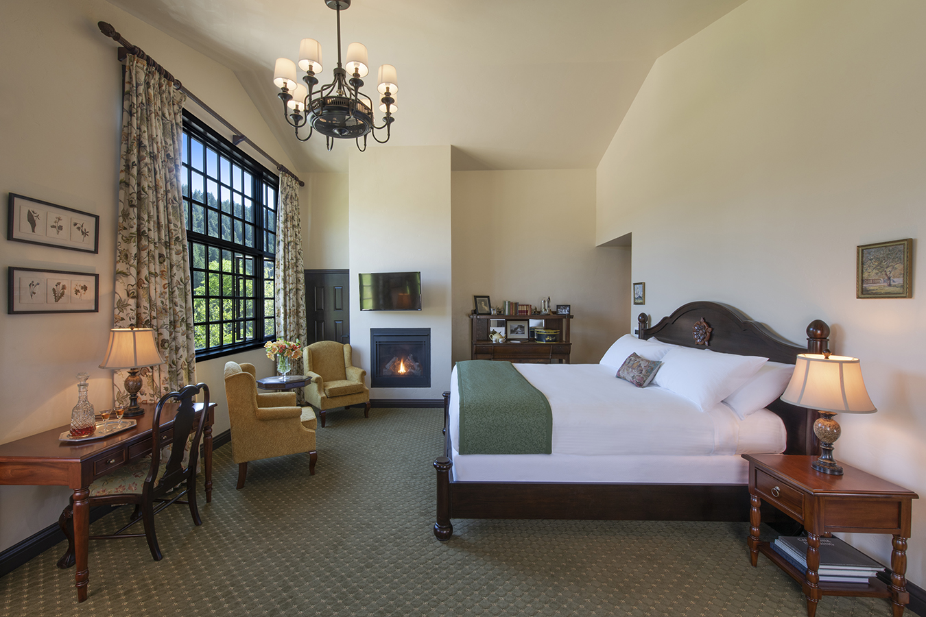 a room with a bed and fireplace