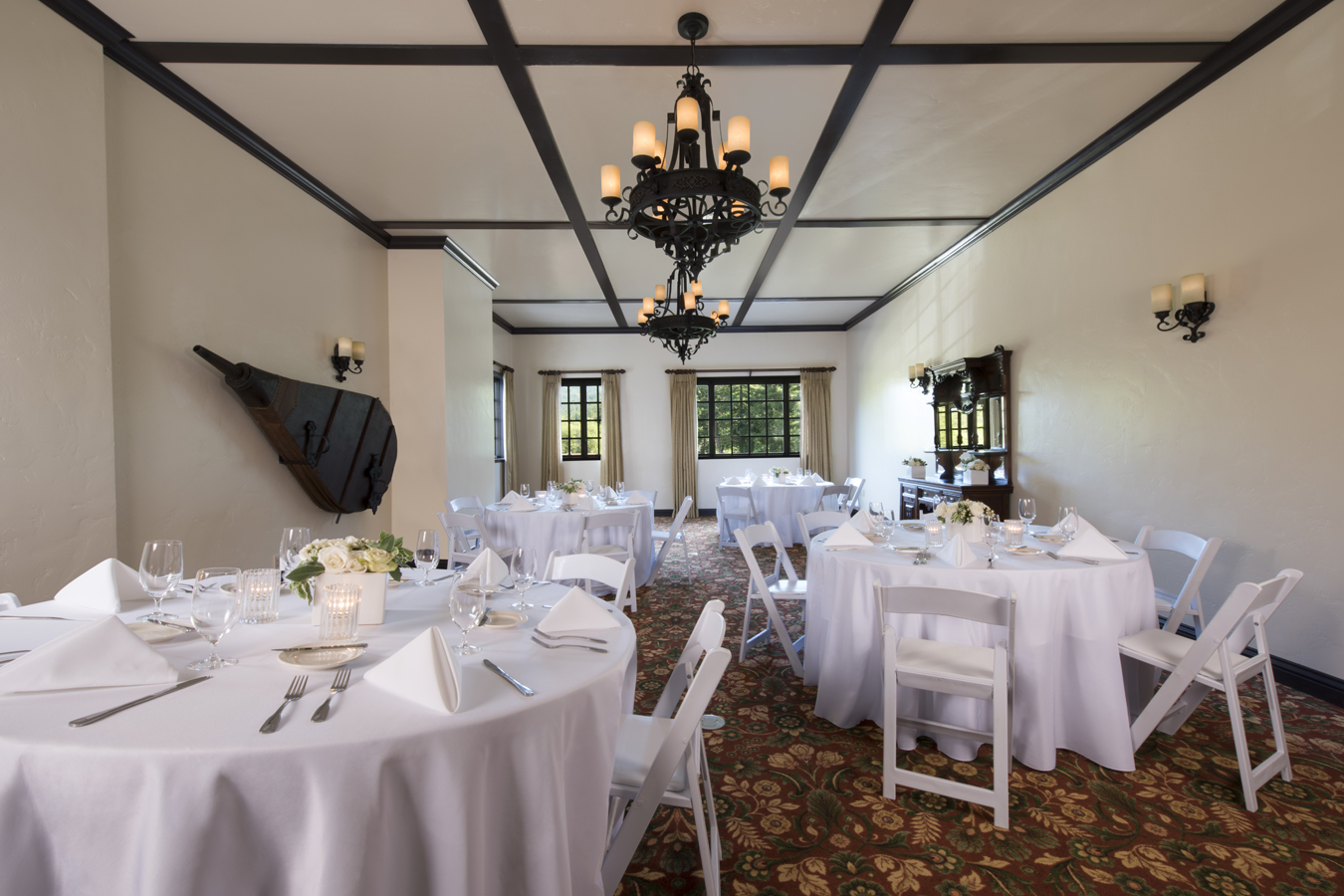 a room with tables and chairs