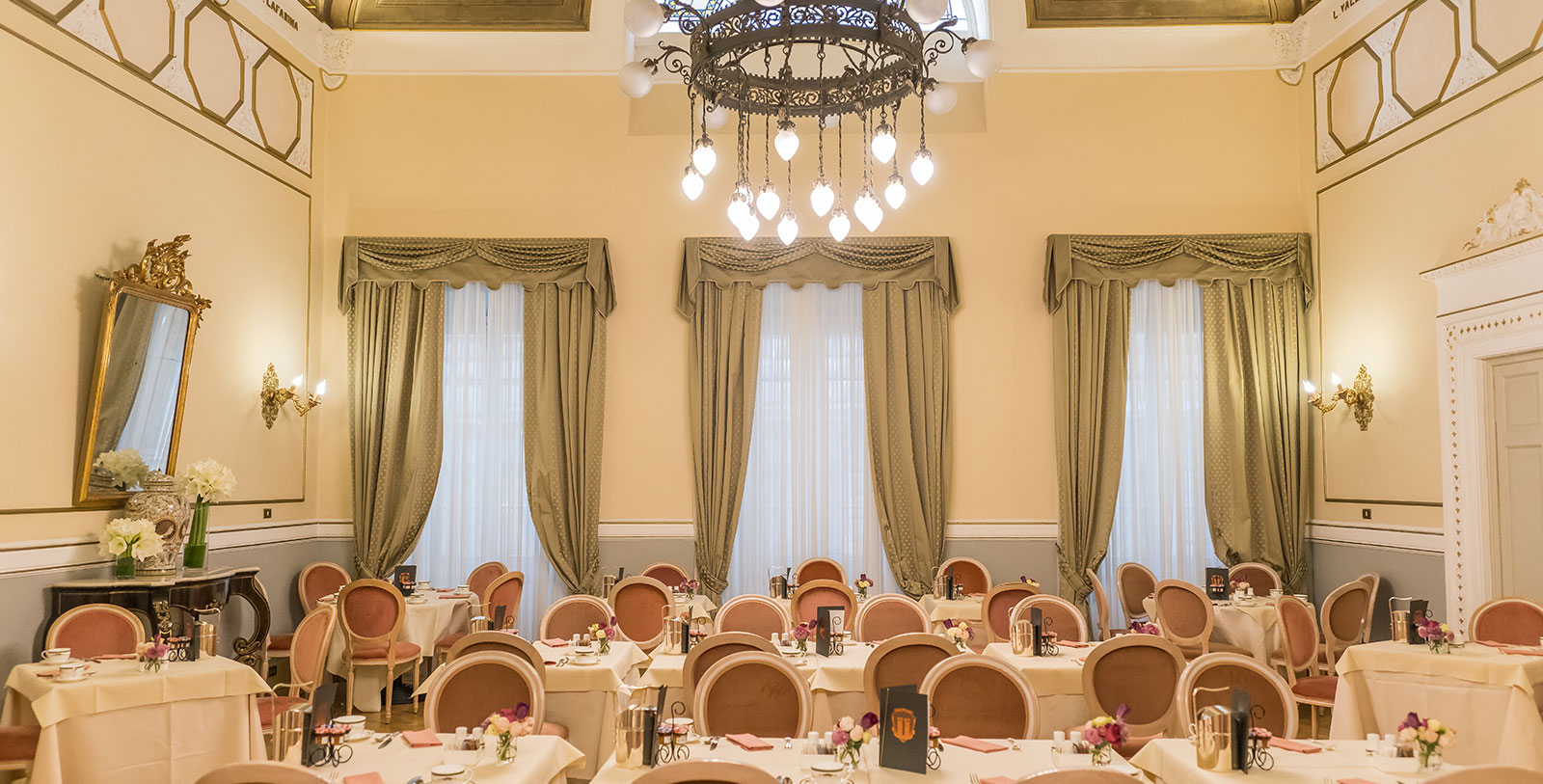 a room with tables and chairs