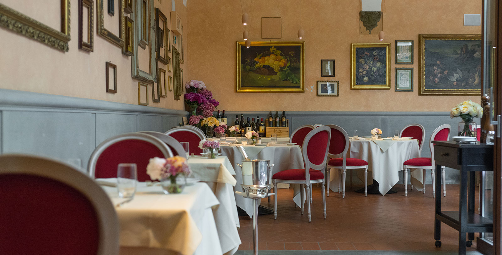 a restaurant with tables and chairs