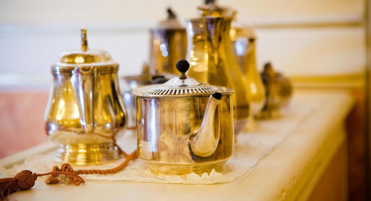 a group of teapots on a table