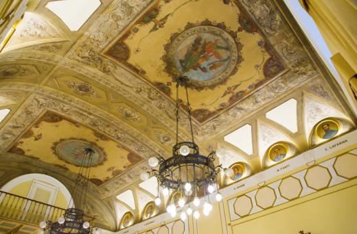 a ceiling with a chandelier from the ceiling
