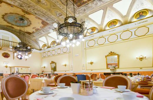 a room with tables and chairs