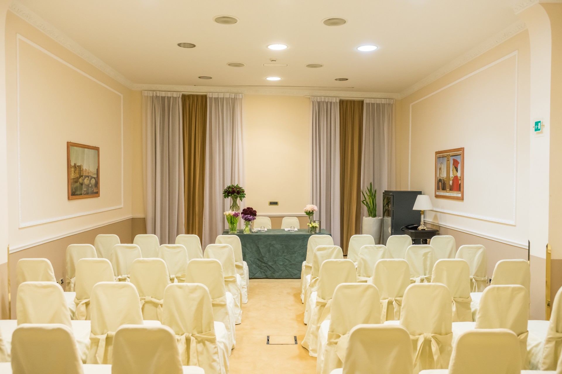 a room with chairs and tables