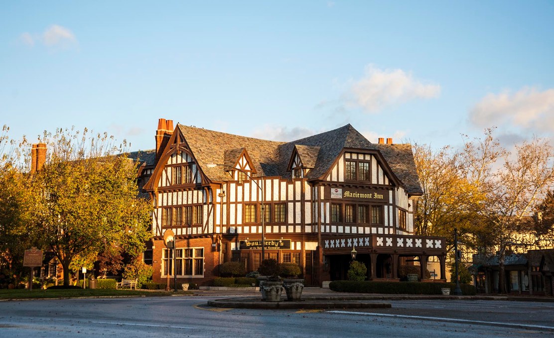 a building with trees in the background
