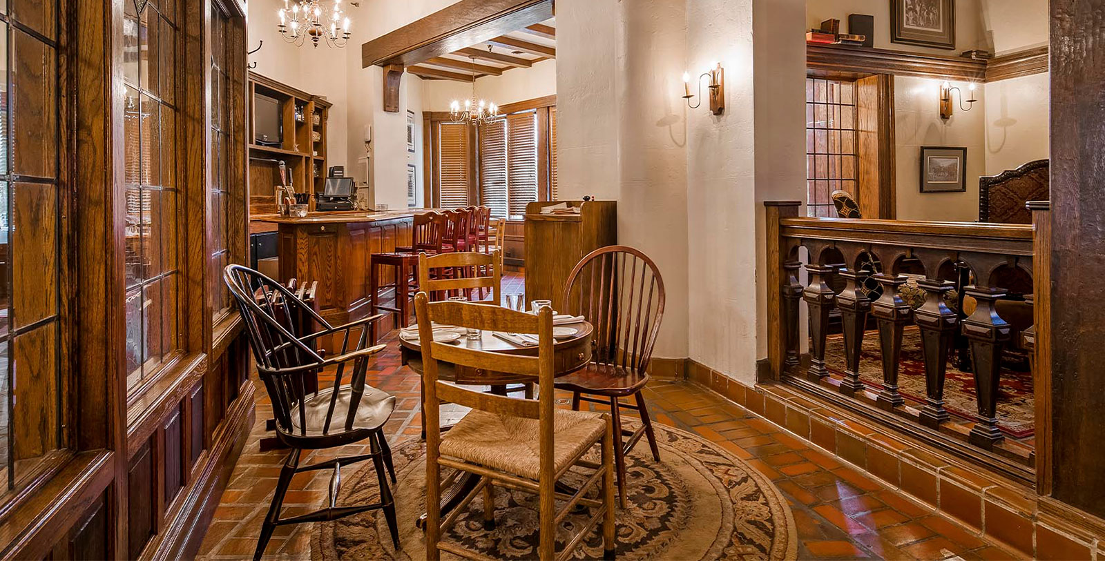 a room with a table and chairs