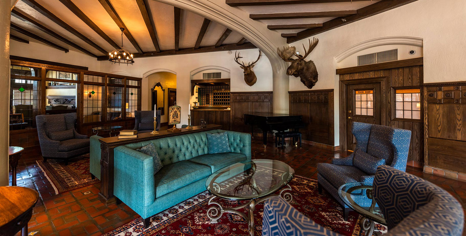 a room with a piano and a couch