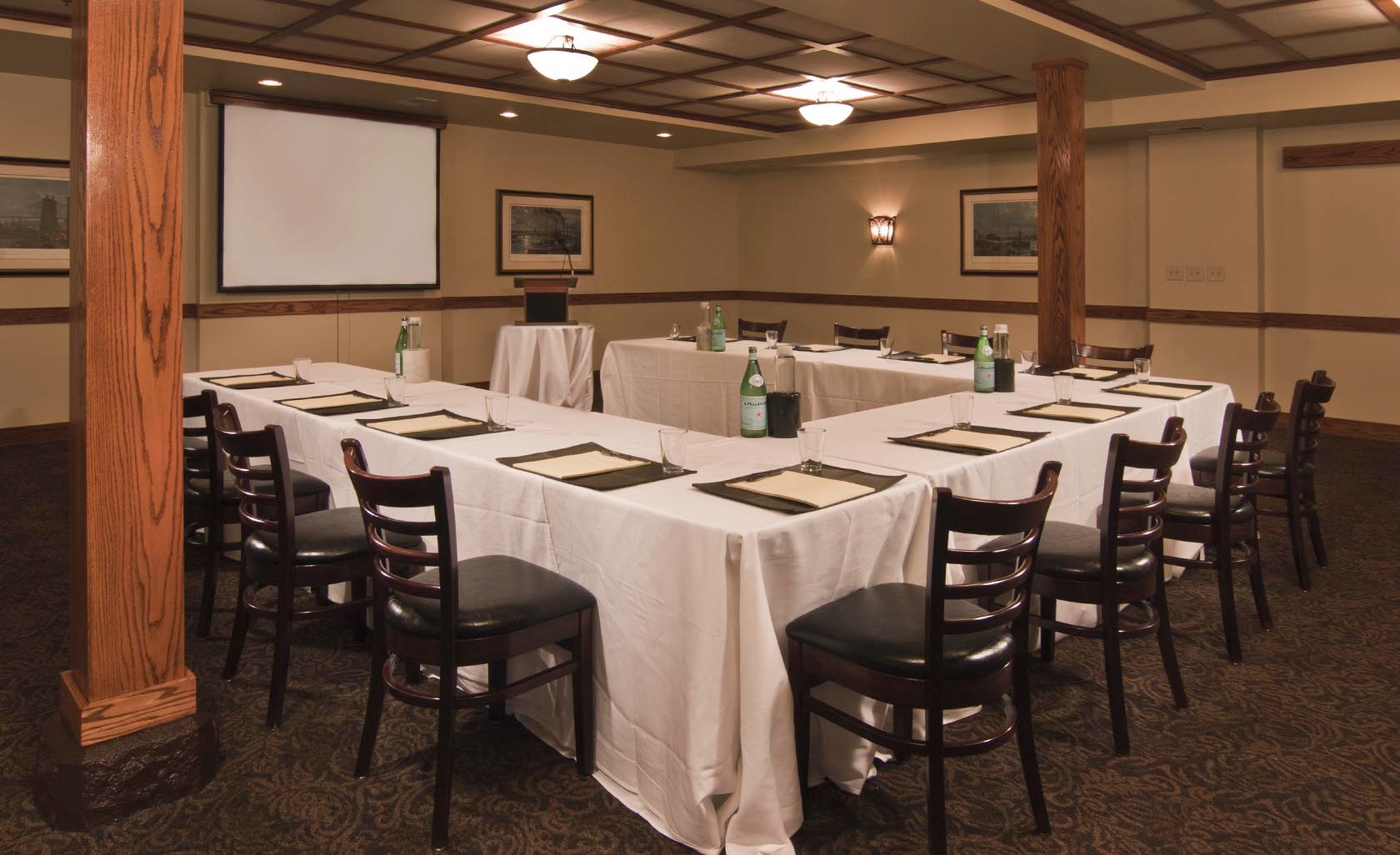 a room with tables and chairs