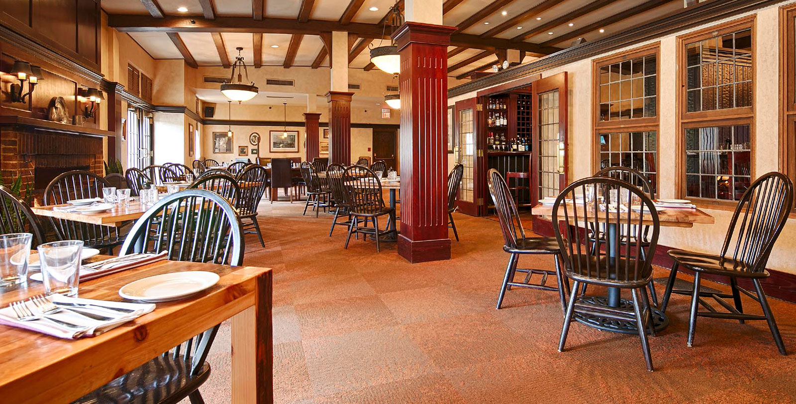 a restaurant with tables and chairs