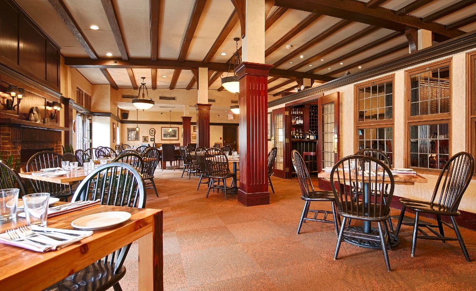 a restaurant with tables and chairs