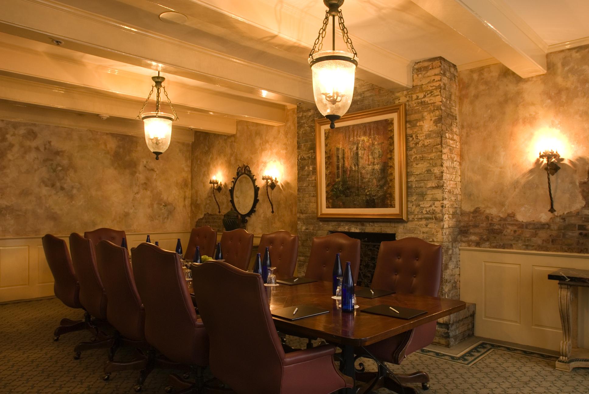 a room with a table and chairs