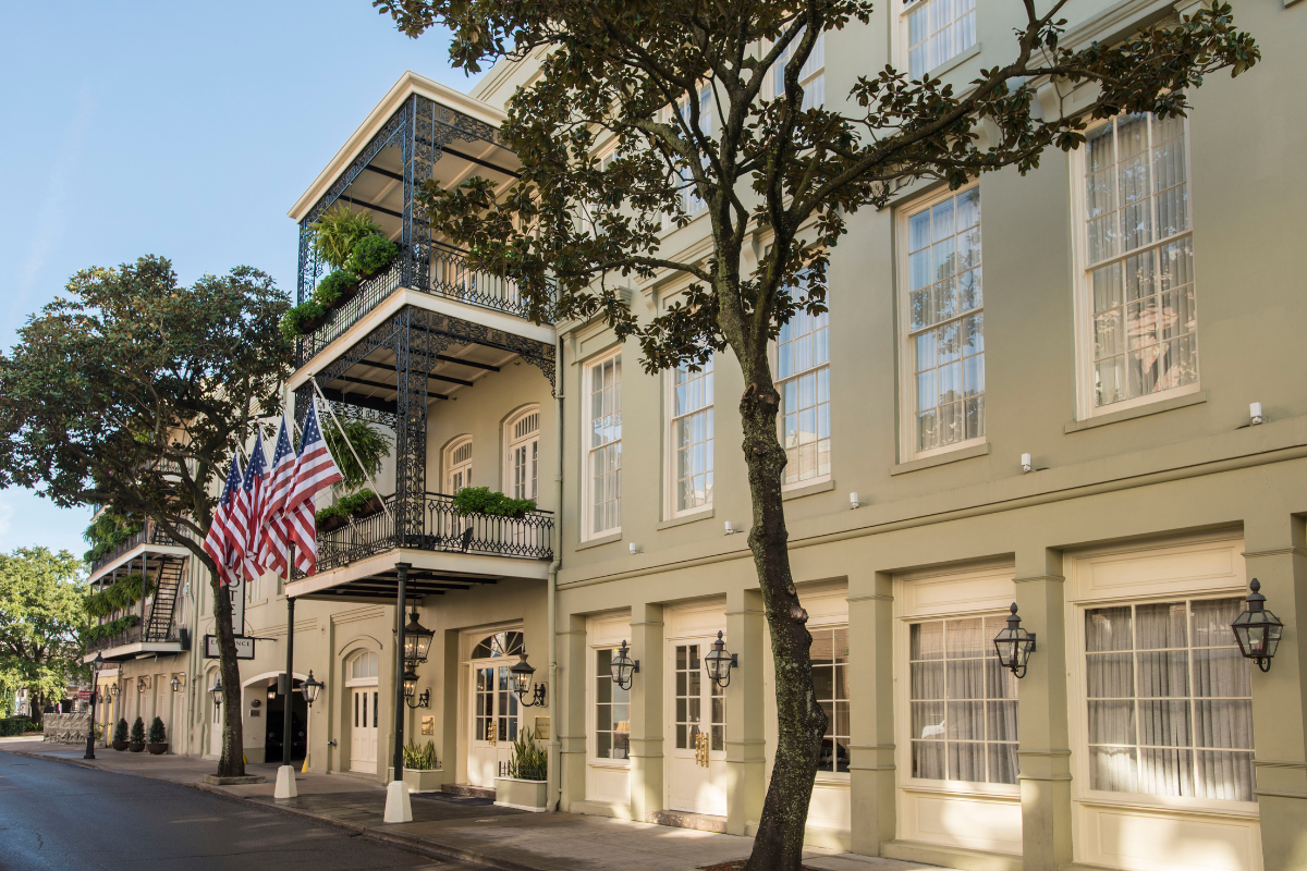 a building with flags on the side