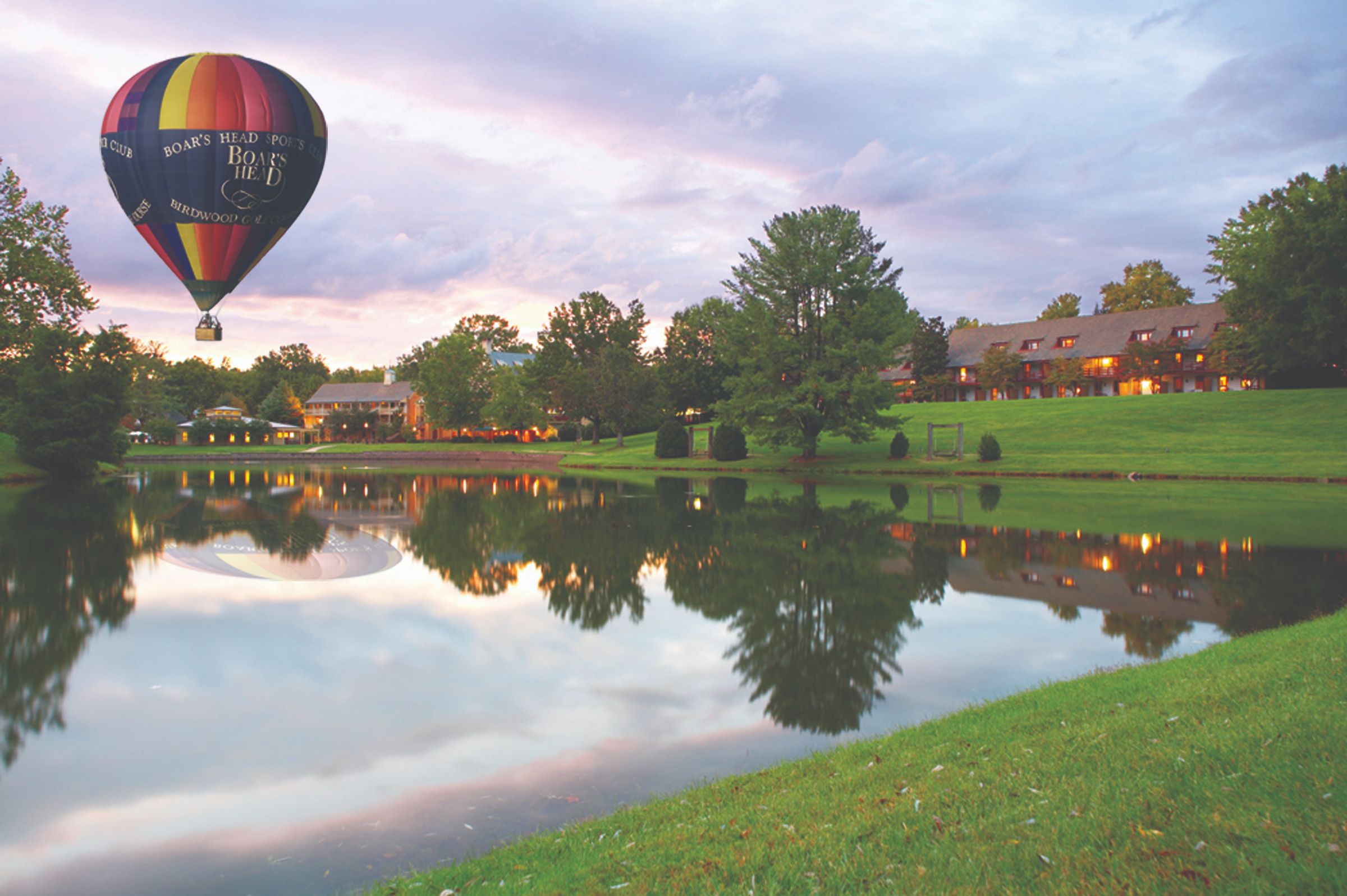 a hot air balloon over a lake