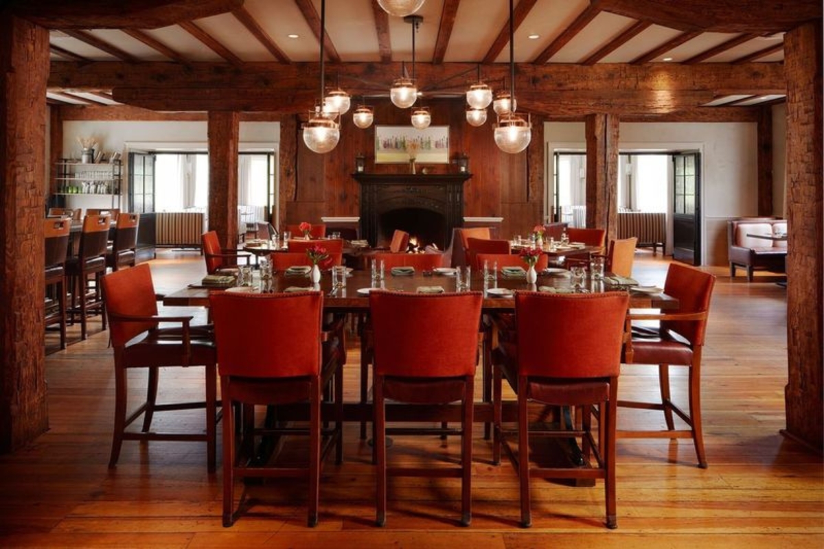 a room with a table and chairs