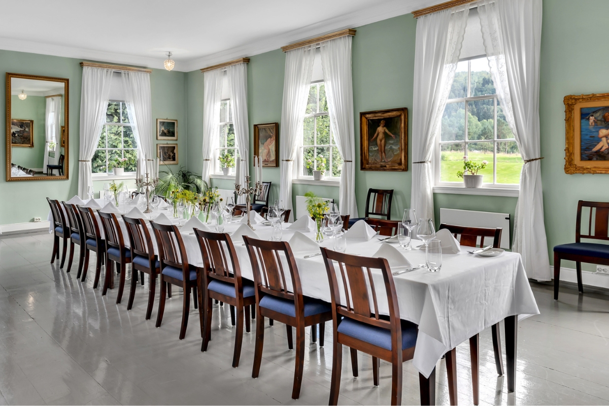 a room with tables and chairs