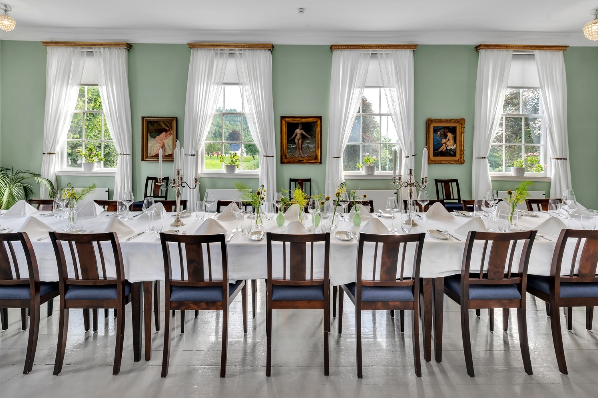 a room with tables and chairs