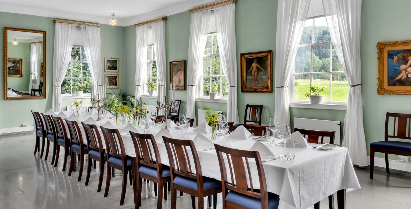 a room with tables and chairs